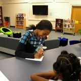 AILEY II dancer Daphne Lee signs autograph for a young admirer