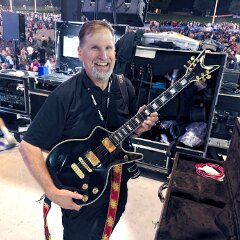 Kansas Photographer, David Carstens and Kerry's iconic black Dean Cadillac guitar